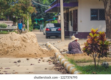 School Janitor Builds A Brick Pathway In School