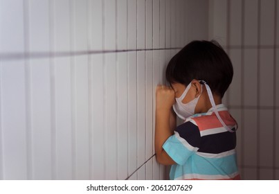 School Kid 4 Years Old Kindergarten Student.Emotional And Angry Crying Asian Kid Boy Bullying In Restroom Mask.No Racism No Bully At School.Autism Kid.Depressed Toddler.Cyber Bullying.Mental Health.