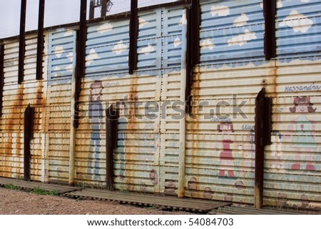 School kid decorations on the US to Mexico border wall in Arizona