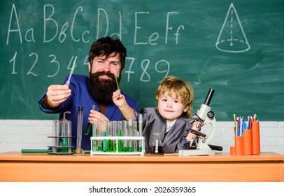 School Lesson. Chemical Experiment. Difficult Focus And Complete School Tasks. Perseverance Pays Off. Attention Deficit Hyperactivity Disorder. Symptoms Of ADHD At School. Teacher Child Test Tubes