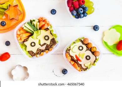 School Lunch Box For Kids On White Wooden Background. Back To School. Top View, Flat Lay