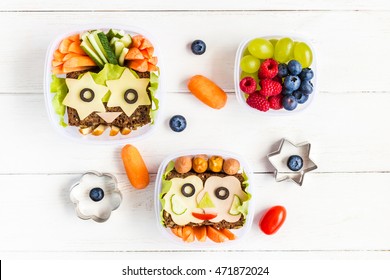 School Lunch Box For Kids On White Wooden Background. Back To School. Top View, Flat Lay