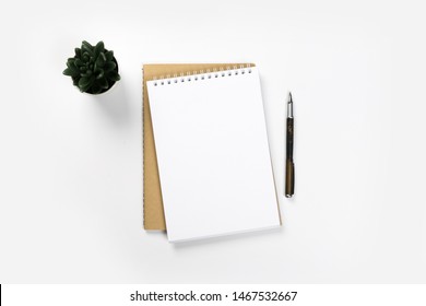 School Notebook On A White Background, Spiral Notepad On A Table. Flatlay