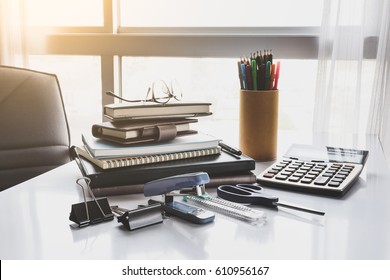 School and office stationary on white desk in office - Shutterstock ID 610956167