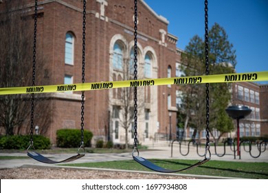 A School Playground In Michigan Is Sealed Off With Cordon Tape. The State Closed All Schools To Thwart The Spread Of The Novel Coronavirus.