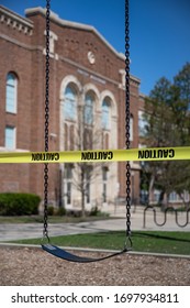 A School Playground In Michigan Is Sealed Off With Cordon Tape. The State Closed All Schools To Thwart The Spread Of The Novel Coronavirus.