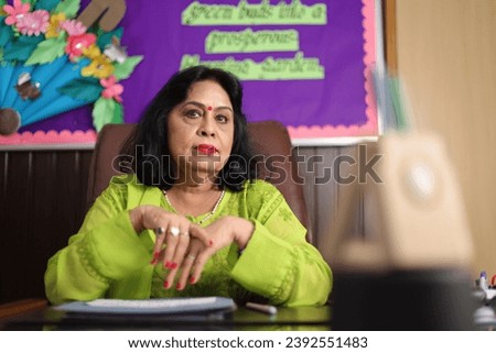 School Principal mam, sad, disappointed of the students of her school, angry.