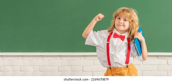 School Pupil Boy On Blackboard, Banner Copy Space. Knowledge Day. Concept Of Education. Nerd Kid With Long Hair At Blackboard. September 1.