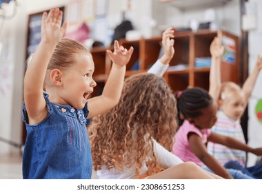 School, raise hands and children in a classroom for education or knowledge at daycare. Kindergarten, happy and young kid students with a question gesture for learning in a lesson together at nursery. - Powered by Shutterstock