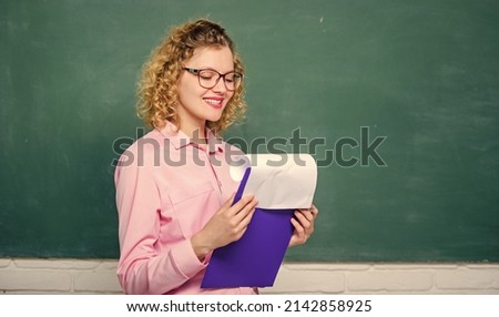 School staff. Smart woman hold tablet documents. Read impressing resume. School principal hiring workers. School teacher job position. Personal profile. Estimate motivational letters of applicants ストックフォト © 