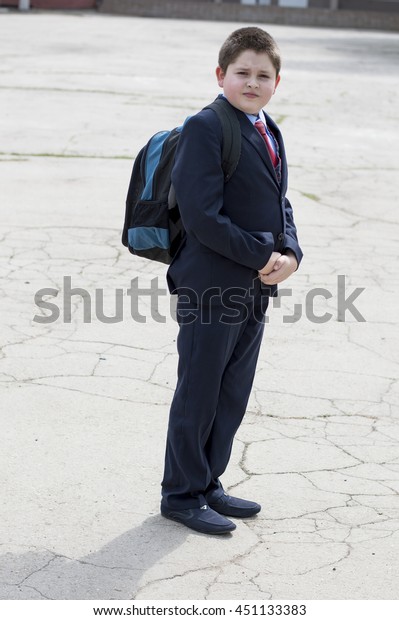 the school student with a backpack\
goes from school, a subject education and\
children