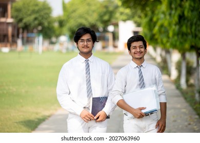 School Student Hanging Out In Corridor Of School 