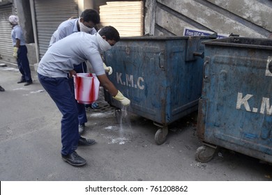 School Student Spread Bleaching Powder At School Neighborhood As Part Of Initiative To Curb The Breeding Sites Of Mosquito Causing Dengue On November 6, 2017 In Calcutta, India. 