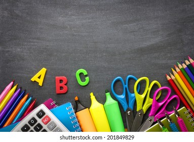 School supplies on blackboard background ready for your design - Powered by Shutterstock