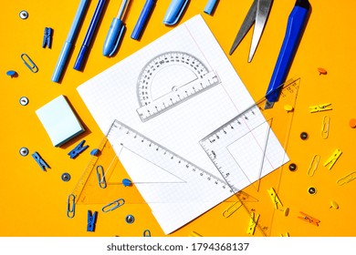 School supplies on yellow background, copy space, scissors, pen, paper clips, ruller, stickers. Back to school, Study at home