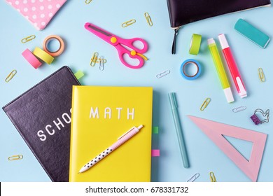 school supplies. pink and blue colors. flat lay composition