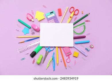 School supplies with sheet of paper, calculator and pencils on lilac background. Top view - Powered by Shutterstock