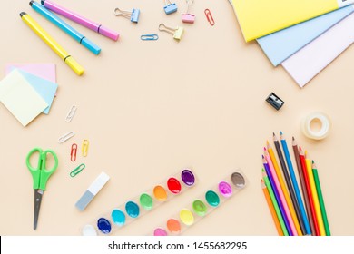 School Supplies Stationery, Colour Pencils, Paints, Paper On Pastel Orange Background, Back To School Concept With Free Copy Space For Text, Modern Elementary Education. Kids Desk, Flat Lay, Overhead