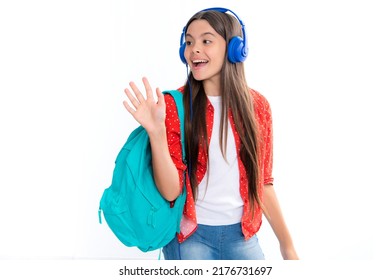 School Teenager Child Girl In Headphones With School Backpack. Teenager Student, Isolated Background. Learning Music. Portrait Of Happy Smiling Teenage Child Girl.