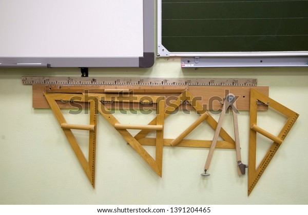 school tools, square,\
ruler, dividers