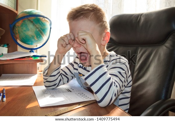 crying while doing homework