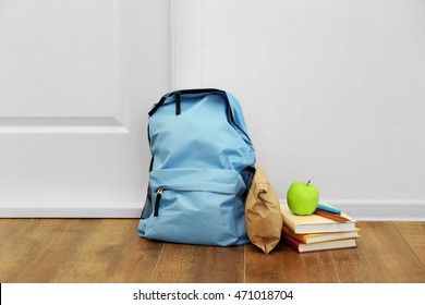 Schoolbag With Lunch Near Door