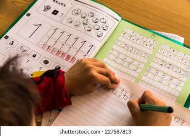 A Schoolboy Doing His Homework. School Assignments Are Made.