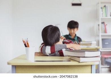 A Schoolboy Fall Asleep In Class During Lessons