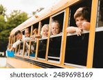 Schoolchildren classmates pupils looking out of the school bus waiting for new educational year semester, coming back to school lessons and homework.