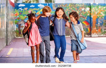 Schoolchildren embracing happy. Multi cultural racial classroom.