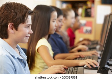 Schoolchildren working on computers