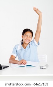 Schoolgirl Hand Up In Classroom