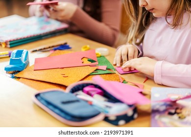 A Schoolgirl Making Art Project At Art Class In Elementary School.