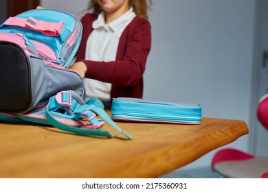 Schoolgirl Put Books And Notes Into Backpack At Home, Pupil Prepare Staff For Education, School Supplies, Back To School Concept.