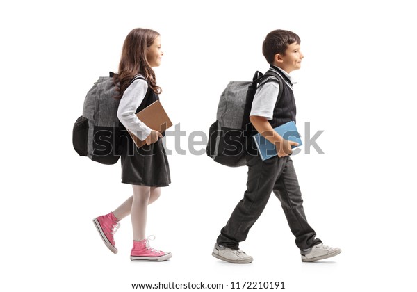 Schoolgirl Schoolboy Backpacks Walking Isolated On Stock Photo (Edit ...