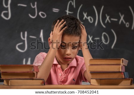 Schoolgirl trying to understand formula