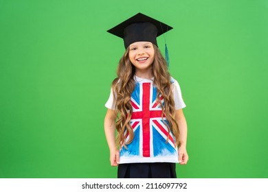 A Schoolgirl In A T-shirt With An Image Of The English Flag. A Graduate In A Ceremonial Hat. Getting An Education Abroad. Teaching English.