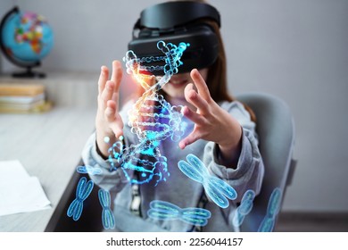 Schoolgirl is using virtual reality simulator headset for study. Child is wearing virtual reality glasses sits at desk and touches 3d model of DNA molecule. Future learning concept - Powered by Shutterstock