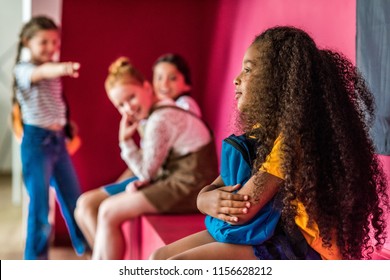 schoolgirls bullying on their african american classmate at school