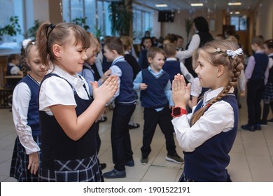 Schoolgirls Play During Recess At School. Elementary Education. Selective Focus. Russia, Novosibirsk, 21.01.2021