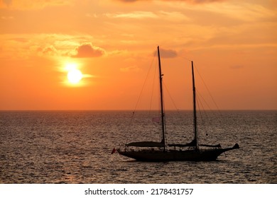 Schooner Sailboat During Sunset With Horizon Over Water In Phuket Island, Thailand.