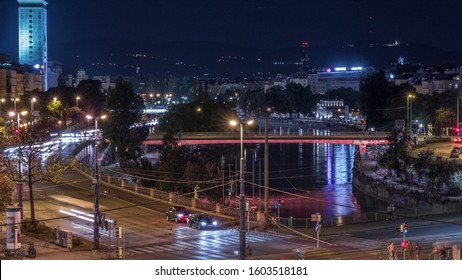 The Schwedenplatz aerial night timelapse. Sweden Square is a square in central Vienna, located at the Danube Canal and one of the most important public transport junction. Old and modern buildings - Powered by Shutterstock