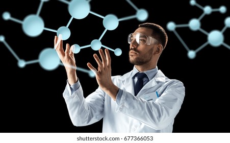 Science, Biology And People Concept - Male Doctor Or Scientist In White Coat And Safety Glasses With Molecules Over Black Background