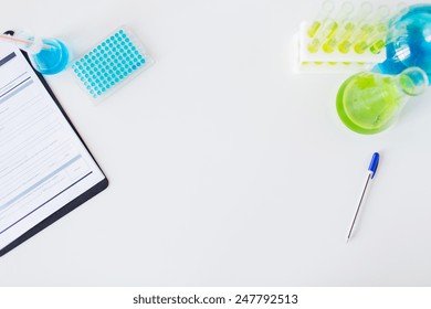 Science, Chemistry, Biology, Medicine And Advertisement Concept - Close Up Of Scientific Laboratory Table With Stuff