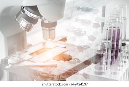 Science Concept. microscope with lab glassware, laboratory research and development 