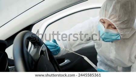 Science, csi and swab for dna evidence in crime scene car for investigation of accident and burglary with hazmat..Forensic, research analysis and person with sample collection for medical observation