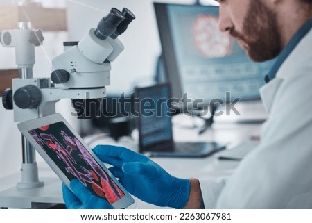 Science, dna and scientist with a tablet in lab doing research on rna, medical innovation or virus. Technology, healthcare and male scientific expert working on pharmaceutical vaccine in laboratory.