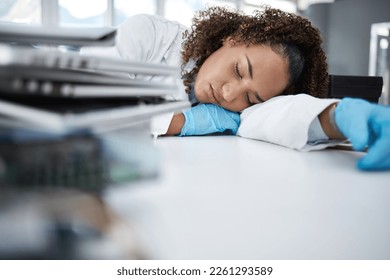 Science, exhausted and scientist taking nap in lab after working on innovation experiment, test or research. Tired, burnout and professional female scientific employee sleeping on desk in laboratory. - Powered by Shutterstock