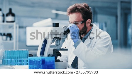 Science, goggles or man in laboratory with microscope, test or examination in biochemistry. Clinical research, glasses or scientist with equipment, medical analysis or inspection in rna development.