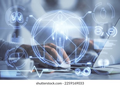 Science hologram with man working on computer on background. Concept of study. Double exposure. - Shutterstock ID 2259169033
